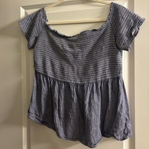 Off the shoulder or wide neck shirt